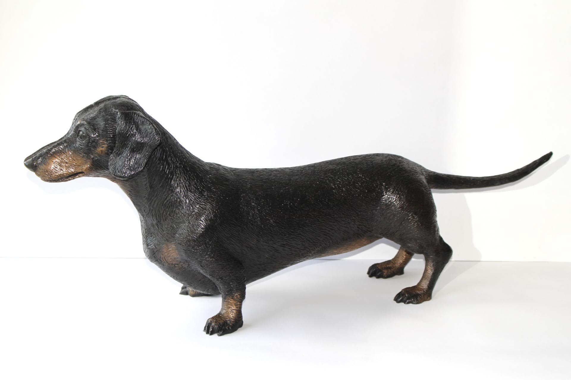 Bronze sculpture of a Dachshund